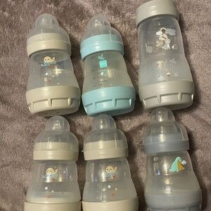 6 mam baby bottles 5-5oz & 1- 9 oz 1 medium flow rest slow